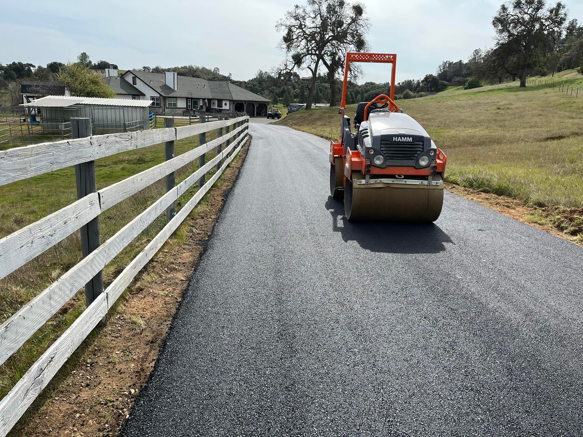 Original Asphalt crew performing asphalt paving in Northeast Florida