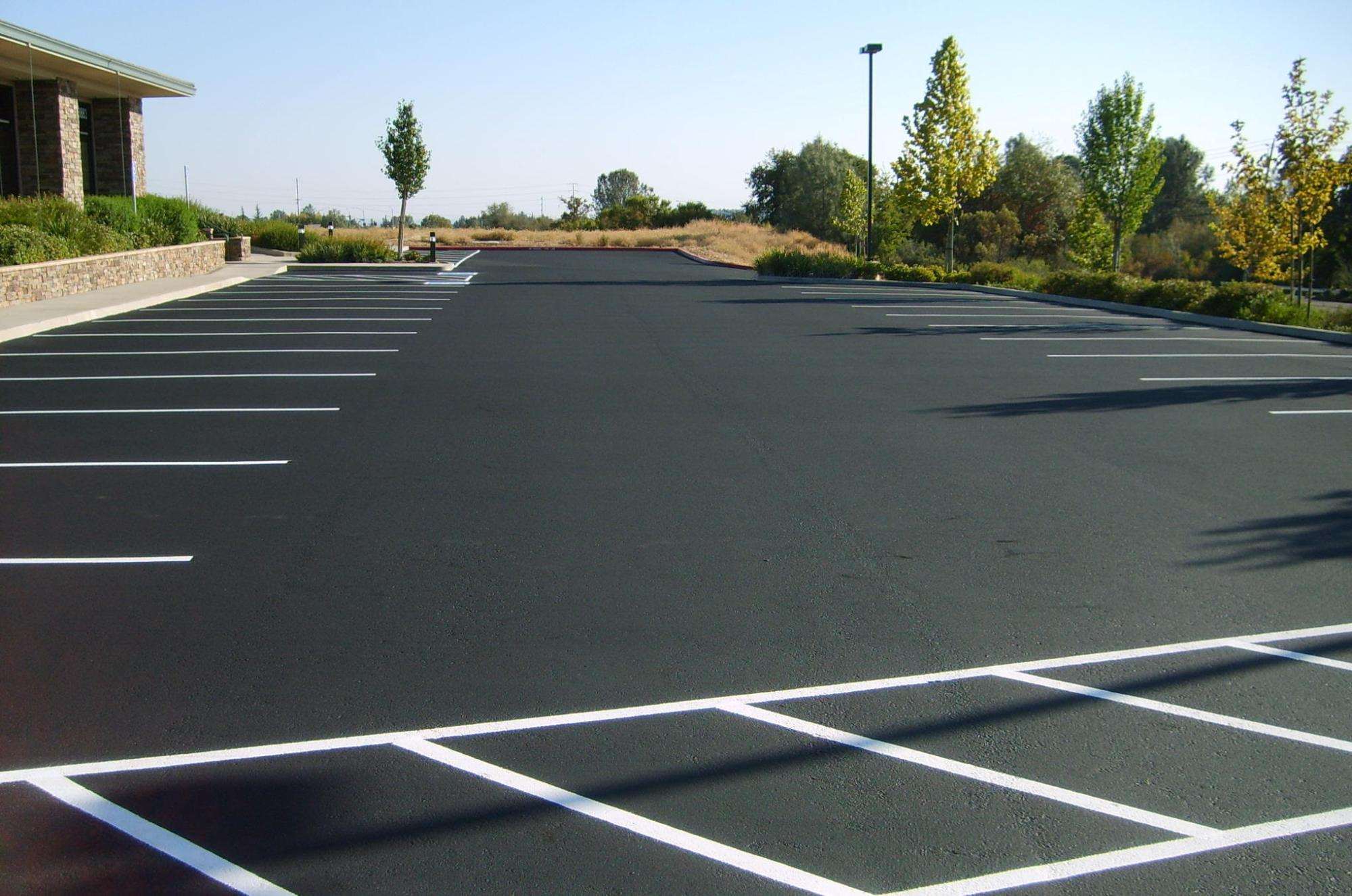 Original Asphalt commercial parking lot paving with striping in Florida