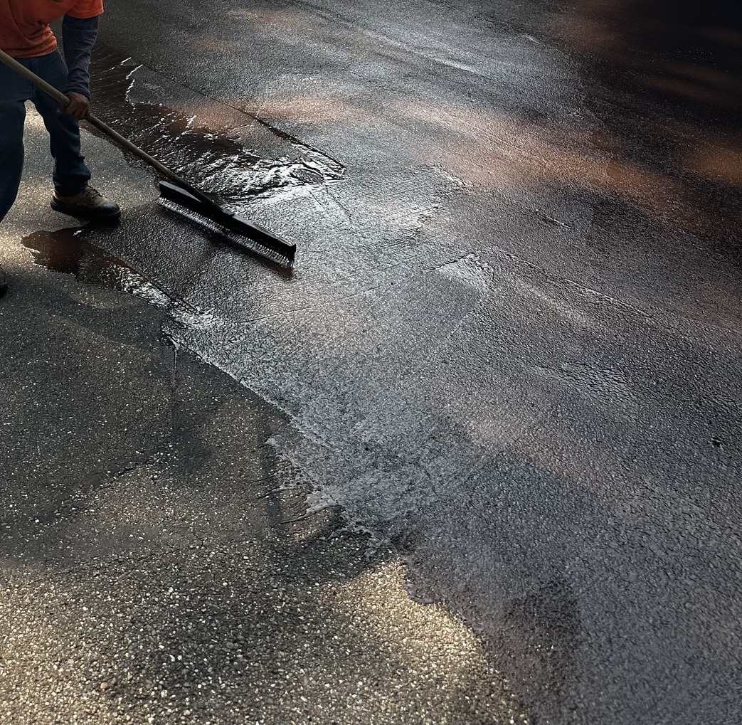 Original Asphalt professional sealcoating application in Florida